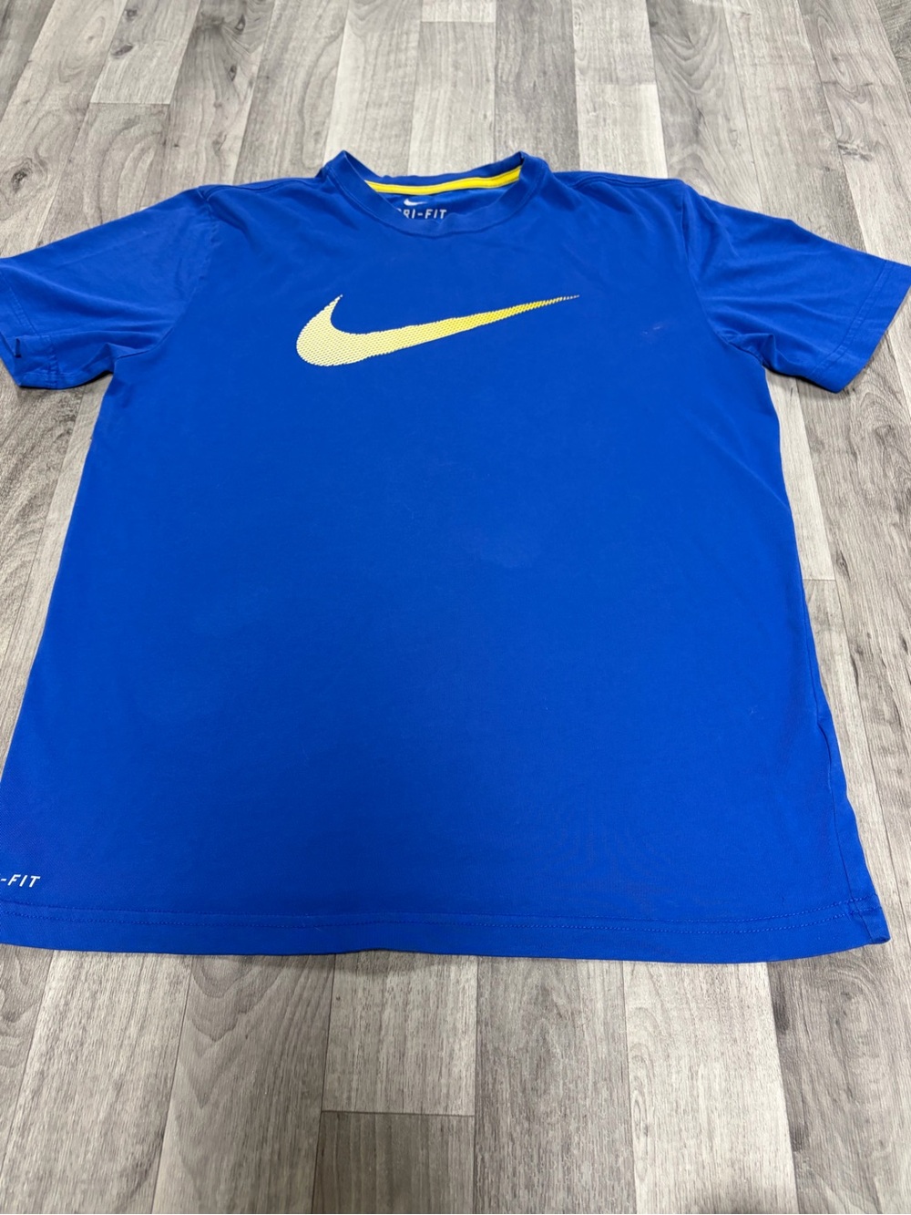 Nike Blue Short Sleeve Dri-FIT Shirt with Yellow Swoosh